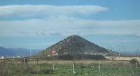 Foto 6: Panormica del afloramiento volcnico calcoalcalino-potsico del Cabezo  Beaza (Cartagena)